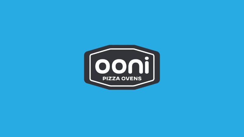 The Ooni pizza ovens logo on a sky blue background