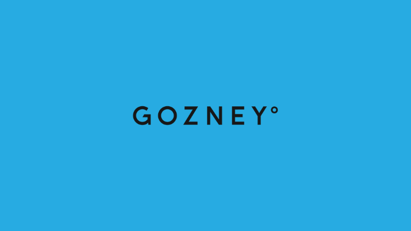 The GOZNEY pizza ovens logo on a sky blue background